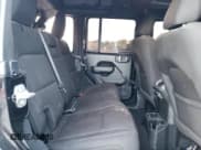 ✅ 2022 Jeep Wrangler Unlimited High Tide • VIN: 1C4HJXDG1NW134486 • Lot: 75280764. Listed on Copart with 61,282 mi. Free auction sales archive from the USA and detailed vehicle history report at DreamBid. Image 10.