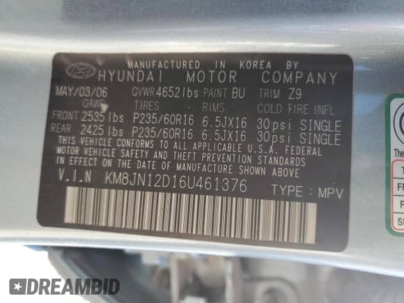 2006 Hyundai Tucson GLS z VIN KM8JN12D16U461376, wystawiony jako Copart lot #82132324 z przebiegiem 127 474 mil mil oraz Szkoda całkowita • Salvage title. Historia ofert i sprzedaży dostępna na DreamBid. Obrazek 12.