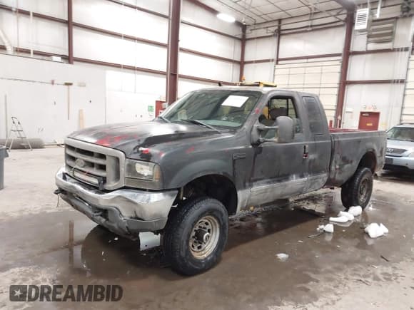 ✅ 2003 Ford F-250 XL • VIN: 1FTNX21P73EC21871 • Lot: 41280545. Listed on IAAI with Not provided. Free auction sales archive from the USA and detailed vehicle history report at DreamBid. Image 2.