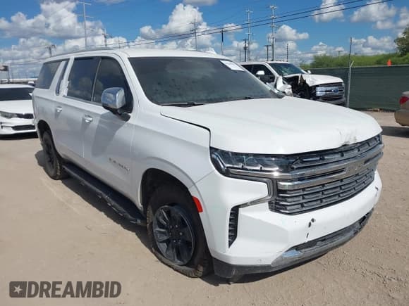✅ 2023 Chevrolet Suburban Premier • VIN: 1GNSKFKD5PR334706 • Lot: 43280982. Wystawiony na IAAI z przebiegiem 76 977 mil. Bezpłatny archiwum sprzedaży aukcyjnych z USA i szczegółowy raport historii pojazdu na DreamBid. Zdjęcie 1.
