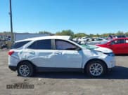 ✅ 2021 Chevrolet Equinox LS • VIN: 3GNAXSEV9MS177393 • Lot: 43393944. Listed on IAAI with 65,872 mi. Free auction sales archive from the USA and detailed vehicle history report at DreamBid. Image 13.