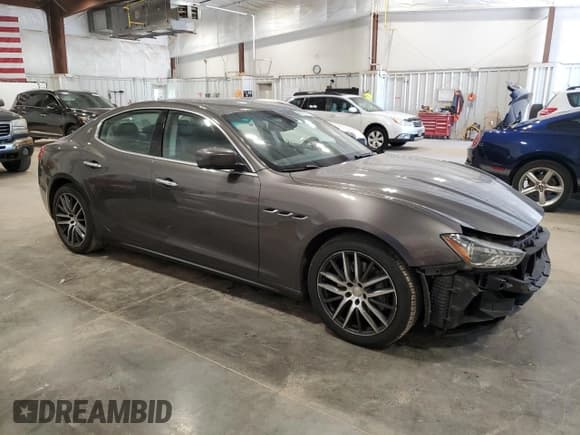 ✅ 2016 Maserati Ghibli • VIN: ZAM57XSA8G1172325 • Lot: 64737155. Listed on Copart with 54,370 mi. Free auction sales archive from the USA and detailed vehicle history report at DreamBid. Image 4.