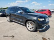 ✅ 2014 Jeep Grand Cherokee • VIN: 1C4RJEJMXEC585632 • Lot: 62036515. Listed on Copart with 148,660 mi. Free auction sales archive from the USA and detailed vehicle history report at DreamBid. Image 4.