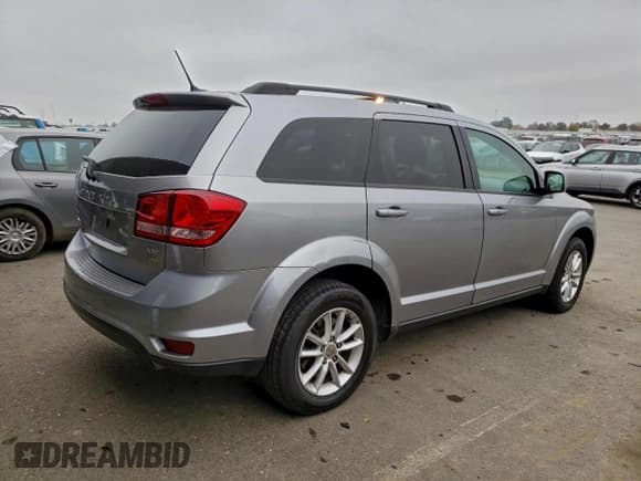 ✅ 2017 Dodge Journey SXT • VIN: 3C4PDCBG5HT526833 • Lot: 95802015. Listed on Copart with 138,703 mi. Free auction sales archive from the USA and detailed vehicle history report at DreamBid. Image 3.
