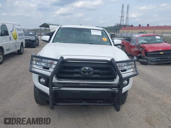 ✅ 2022 Toyota Tacoma SR • VIN: 3TYSZ5AN1NT092590 • Лот: 42148792. Опубликован ранее на IAAI с пробегом 58 154 миль. Бесплатный доступ к архиву аукционных продаж из США и подробный отчёт об истории автомобиля на DreamBid. Изображение 12.
