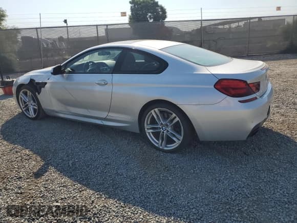 ✅ 2013 BMW 6 Series 650i • VIN: WBAYM9C51DDW20225 • Лот: 67766635. Опубликован ранее на Copart с пробегом 165 045 миль. Бесплатный доступ к архиву аукционных продаж из США и подробный отчёт об истории автомобиля на DreamBid. Изображение 2.