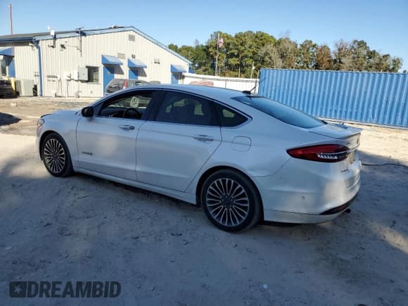 ✅ 2017 Ford Fusion Hybrid Titanium • VIN: 3FA6P0RUXHR249774 • Lot: 92848715. Listed on Copart with 114,397 mi. Free auction sales archive from the USA and detailed vehicle history report at DreamBid. Image 2.