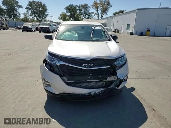 ✅ 2020 Chevrolet Equinox LS • VIN: 2GNAXHEV4L6169489 • Лот: 80621715. Опубликован ранее на Copart с пробегом 87 259 миль. Бесплатный доступ к архиву аукционных продаж из США и подробный отчёт об истории автомобиля на DreamBid. Изображение 14.