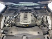 ✅ 2015 Infiniti QX70 • VIN: JN8CS1MW1FM480891 • Lot: 86780525. Listed on Copart with 122,309 mi. Free auction sales archive from the USA and detailed vehicle history report at DreamBid. Image 12.