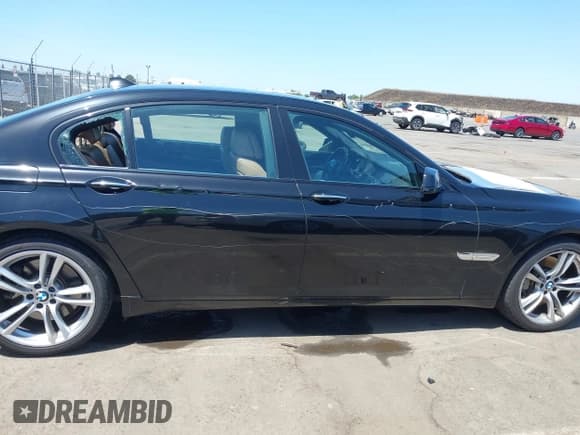 ✅ 2011 BMW 7 Series 750Li • VIN: WBAKB8C5XBCY64531 • Лот: 42350009. Опубликован ранее на IAAI с пробегом 113 893 миль. Бесплатный доступ к архиву аукционных продаж из США и подробный отчёт об истории автомобиля на DreamBid. Изображение 13.