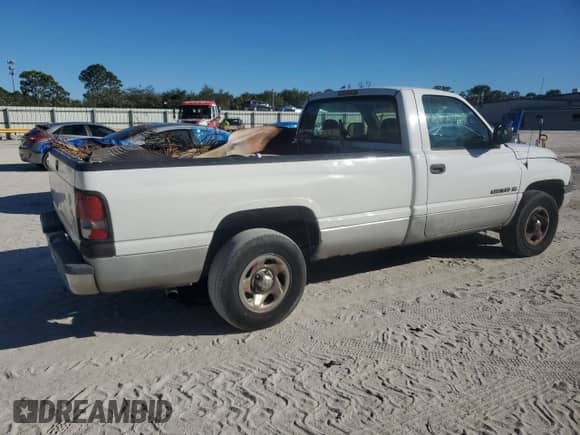 2001 Dodge 1500 z VIN 1B7HC16Y31S185082, wystawiony jako Copart lot #82000214 z przebiegiem 235 923 mil mil oraz Szkoda całkowita • Salvage title. Historia ofert i sprzedaży dostępna na DreamBid. Obrazek 3.