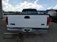 ✅ 1998 Ford F-150 • VIN: 1FTZF1720WNB90719 • Lot: 61631335. Wystawiony na Copart z przebiegiem 153 119 mil. Bezpłatny archiwum sprzedaży aukcyjnych z USA i szczegółowy raport historii pojazdu na DreamBid. Zdjęcie 6.