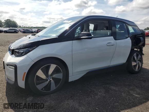 ✅ 2018 BMW i3 • VIN: WBY7Z2C58JVE64814 • Лот: 63661435. Опубликован ранее на Copart с пробегом 61 990 миль. Бесплатный доступ к архиву аукционных продаж из США и подробный отчёт об истории автомобиля на DreamBid. Изображение 1.