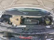 ✅ 2001 GMC Savana • VIN: 1GTFG25M811903859 • Lot: 94085855. Listed on Copart with 128,185 mi. Free auction sales archive from the USA and detailed vehicle history report at DreamBid. Image 12.