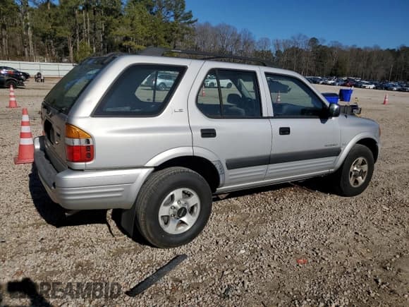 ✅ 1999 Isuzu Rodeo S • VIN: 4S2CK58W7X4357910 • Lot: 86955254. Wystawiony na Copart z przebiegiem 105 593 mil. Bezpłatny archiwum sprzedaży aukcyjnych z USA i szczegółowy raport historii pojazdu na DreamBid. Zdjęcie 3.
