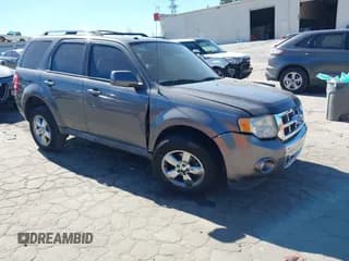 ✅ 2012 Ford Escape Limited • VIN: 1FMCU0EG0CKC13123 • Lot: 43511292. Listed on IAAI with 236,147 mi. Free auction sales archive from the USA and detailed vehicle history report at DreamBid. Image 1.