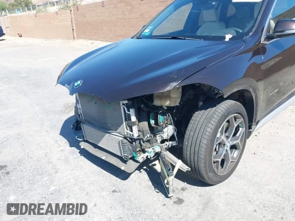 ✅ 2018 BMW X1 sDrive28i • VIN: WBXHU7C37J5L05511 • Lot: 42980003. Listed on IAAI with 25,925 mi. Free auction sales archive from the USA and detailed vehicle history report at DreamBid. Image 6.