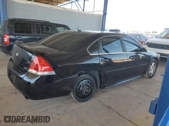 ✅ 2014 Chevrolet Impala LT • VIN: 2G1WB5E39E1121571 • Лот: 70295884. Опубликован ранее на Copart с пробегом 51 427 миль. Бесплатный доступ к архиву аукционных продаж из США и подробный отчёт об истории автомобиля на DreamBid. Изображение 3.