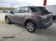 ✅ 2007 Mazda CX-7 Grand Touring • VIN: JM3ER293670140785 • Lot: 43839802. Wystawiony na IAAI z przebiegiem 89 249 mil. Bezpłatny archiwum sprzedaży aukcyjnych z USA i szczegółowy raport historii pojazdu na DreamBid. Zdjęcie 3.