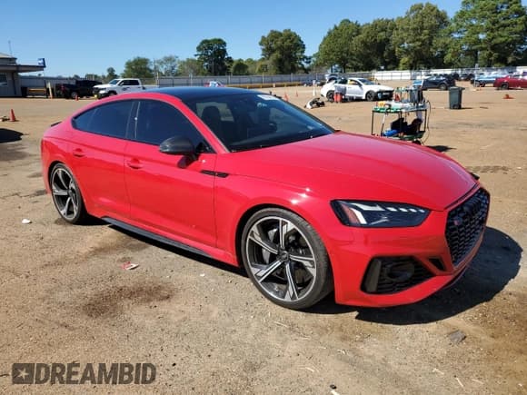 ✅ 2022 Audi RS 5 Sportback • VIN: WUAAWCF57NA901099 • Лот: 85764915. Опубликован ранее на Copart с пробегом 37 522 миль. Бесплатный доступ к архиву аукционных продаж из США и подробный отчёт об истории автомобиля на DreamBid. Изображение 4.