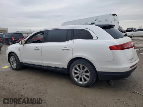 ✅ 2013 Lincoln MKT • VIN: 2LMHJ5FKXDBL51749 • Lot: 86566394. Wystawiony na Copart z przebiegiem 226 799 mil. Bezpłatny archiwum sprzedaży aukcyjnych z USA i szczegółowy raport historii pojazdu na DreamBid. Zdjęcie 2.