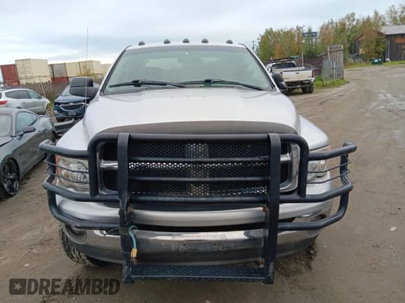 2004 Dodge 3500 ST с VIN 3D7LU38C14G201690, выставлен на аукционе Copart как лот 69419695 с пробегом 166 308 миль миль и Списание • Salvage title. История ставок и продаж доступна на DreamBid. Изображение 5.
