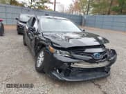 ✅ 2019 Toyota Camry Hybrid LE • VIN: 4T1B31HK9KU005135 • Lot: 43555905. Wystawiony na IAAI z przebiegiem 100 291 mil. Bezpłatny archiwum sprzedaży aukcyjnych z USA i szczegółowy raport historii pojazdu na DreamBid. Zdjęcie 1.