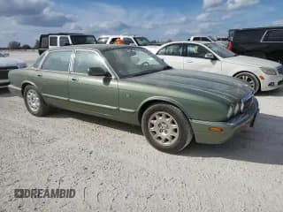 ✅ 1999 Jaguar XJ • VIN: SAJHD1043XC869413 • Лот: 76940624. Опубликован ранее на Copart с пробегом Не указан. Бесплатный доступ к архиву аукционных продаж из США и подробный отчёт об истории автомобиля на DreamBid. Изображение 4.