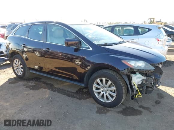 ✅ 2012 Mazda CX-7 i Touring • VIN: JM3ER2CM1C0412090 • Lot: 43807986. Wystawiony na IAAI z przebiegiem 133 874 mil. Bezpłatny archiwum sprzedaży aukcyjnych z USA i szczegółowy raport historii pojazdu na DreamBid. Zdjęcie 1.