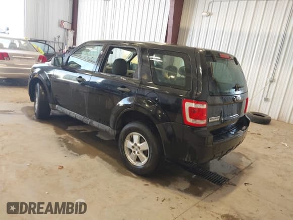 ✅ 2009 Ford Escape XLS • VIN: 1FMCU027X9KC99165 • Lot: 42565928. Listed on IAAI with 179,177 mi. Free auction sales archive from the USA and detailed vehicle history report at DreamBid. Image 3.