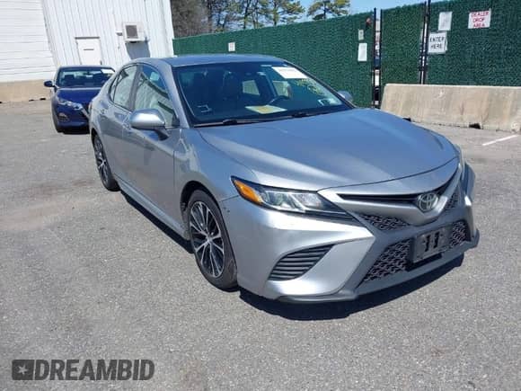 2019 Toyota Camry LE z VIN 4T1B11HK5KU719169, wystawiony jako IAAI lot #41972503 z przebiegiem 194 259 mil mil oraz . Historia ofert i sprzedaży dostępna na DreamBid. Obrazek 1.