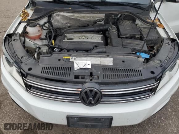 ✅ 2017 Volkswagen Tiguan S • VIN: WVGBV7AX1HK044454 • Lot: 84602705. Wystawiony na Copart z przebiegiem 89 181 mil. Bezpłatny archiwum sprzedaży aukcyjnych z USA i szczegółowy raport historii pojazdu na DreamBid. Zdjęcie 11.