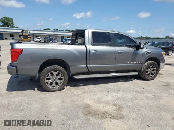 ✅ 2018 Nissan Titan Platinum Reserve • VIN: 1N6BA1F46JN518038 • Лот: 61191525. Опубликован ранее на Copart с пробегом 123 846 миль. Бесплатный доступ к архиву аукционных продаж из США и подробный отчёт об истории автомобиля на DreamBid. Изображение 3.