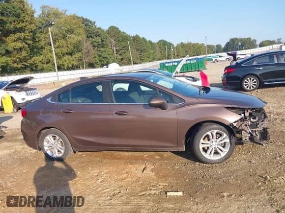 2019 Chevrolet Cruze LT with VIN 1G1BE5SM3K7137024, listed as a IAAI auction lot 43209295 with 90,633 mi miles and . Bid and sale history available at DreamBid. Image 14.