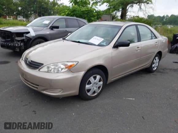 ✅ 2004 Toyota Camry LE • VIN: 4T1BE32K14U859389 • Lot: 41879442. Listed on IAAI with 177,929 mi. Free auction sales archive from the USA and detailed vehicle history report at DreamBid. Image 2.