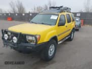✅ 2000 Nissan Xterra XE • VIN: 5N1ED28YXYC529347 • Лот: 43740157. Опубликован ранее на IAAI с пробегом 215 338 миль. Бесплатный доступ к архиву аукционных продаж из США и подробный отчёт об истории автомобиля на DreamBid. Изображение 2.