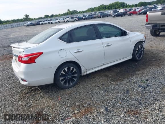 ✅ 2016 Nissan Sentra SL • VIN: 3N1AB7AP5GY256415 • Lot: 42366708. Listed on IAAI with 134,210 mi. Free auction sales archive from the USA and detailed vehicle history report at DreamBid. Image 4.