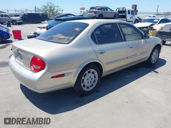 ✅ 2001 Nissan Maxima SE • VIN: JN1CA31D21T841656 • Lot: 42876639. Wystawiony na IAAI z przebiegiem 75 279 mil. Bezpłatny archiwum sprzedaży aukcyjnych z USA i szczegółowy raport historii pojazdu na DreamBid. Zdjęcie 4.