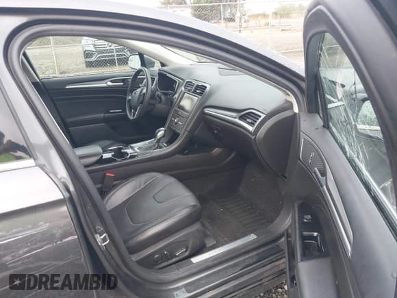 ✅ 2016 Ford Fusion Titanium • VIN: 3FA6P0K91GR248968 • Лот: 43181413. Опубликован ранее на IAAI с пробегом 126 692 миль. Бесплатный доступ к архиву аукционных продаж из США и подробный отчёт об истории автомобиля на DreamBid. Изображение 5.