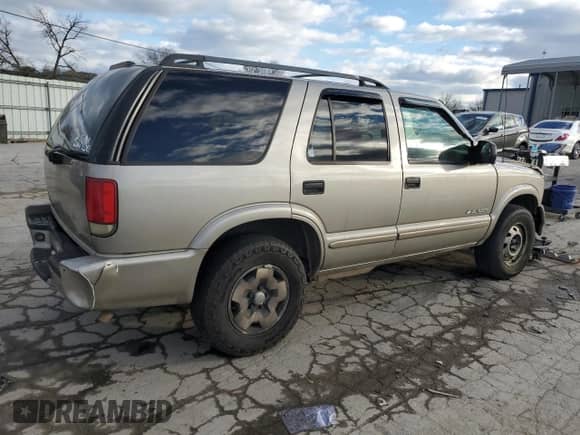 2004 Chevrolet Blazer LS z VIN 1GNDT13X54K134480, wystawiony jako Copart lot #82024914 z przebiegiem 219 210 mil mil oraz Szkoda całkowita • Salvage title. Historia ofert i sprzedaży dostępna na DreamBid. Obrazek 3.