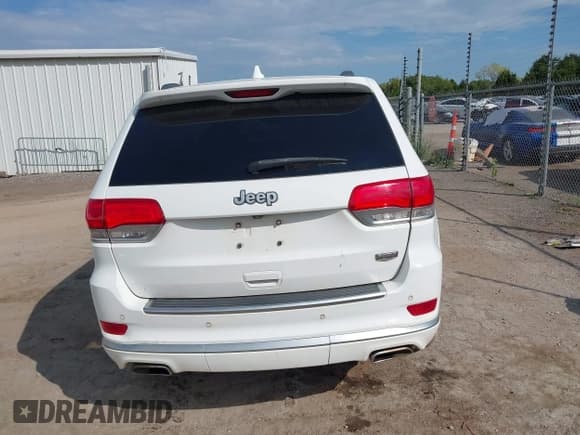 ✅ 2015 Jeep Grand Cherokee Summit • VIN: 1C4RJEJG5FC105296 • Lot: 43231201. Listed on IAAI with 124,311 mi. Free auction sales archive from the USA and detailed vehicle history report at DreamBid. Image 17.