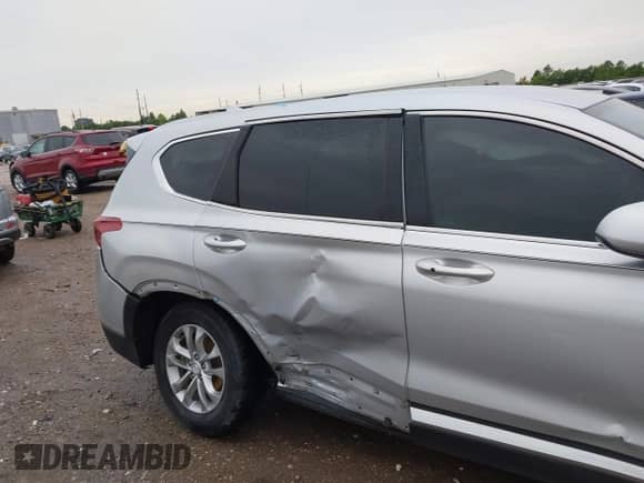 2019 Hyundai Santa Fe SEL Plus z VIN 5NMS33AD3KH130800, wystawiony jako IAAI lot #42666362 z przebiegiem 102 952 mil mil oraz . Historia ofert i sprzedaży dostępna na DreamBid. Obrazek 6.