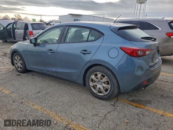 ✅ 2014 Mazda 3 i Sport • VIN: JM1BM1K77E1144076 • Lot: 94023405. Listed on Copart with 135,586 mi. Free auction sales archive from the USA and detailed vehicle history report at DreamBid. Image 2.