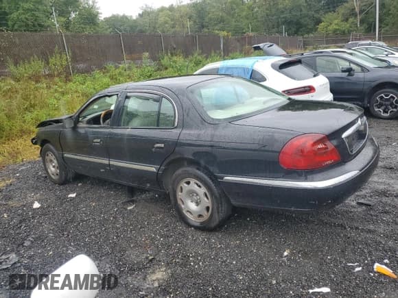 ✅ 2002 Lincoln Continental • VIN: 1LNHM97VX2Y664075 • Lot: 73747234. Wystawiony na Copart z przebiegiem Nie podano. Bezpłatny archiwum sprzedaży aukcyjnych z USA i szczegółowy raport historii pojazdu na DreamBid. Zdjęcie 2.