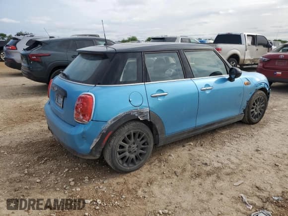 ✅ 2017 MINI Hardtop 4 Door Cooper • VIN: WMWXU1C55H2E18599 • Lot: 52110415. Listed on Copart with 63,753 mi. Free auction sales archive from the USA and detailed vehicle history report at DreamBid. Image 3.
