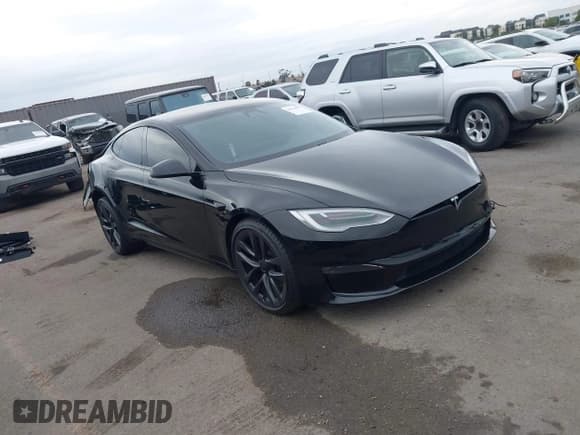 ✅ 2022 Tesla Model S • VIN: 5YJSA1E5XNF463529 • Lot: 43714895. Wystawiony na IAAI z przebiegiem 55 399 mil. Bezpłatny archiwum sprzedaży aukcyjnych z USA i szczegółowy raport historii pojazdu na DreamBid. Zdjęcie 1.