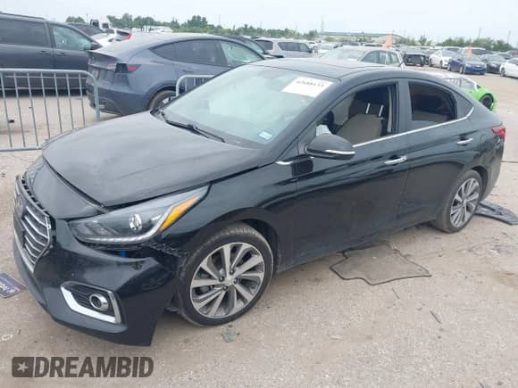 2022 Hyundai Accent Limited z VIN 3KPC34A67NE177531, wystawiony jako IAAI lot #42688133 z przebiegiem 63 083 mil mil oraz . Historia ofert i sprzedaży dostępna na DreamBid. Obrazek 2.