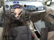 ✅ 2010 Honda Insight EX • VIN: JHMZE2H79AS002145 • Lot: 92627145. Listed on Copart with 144,749 mi. Free auction sales archive from the USA and detailed vehicle history report at DreamBid. Image 8.