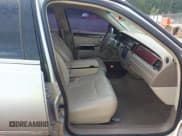 ✅ 2004 Lincoln Town Car Signature • VIN: 1LNHM81WX4Y662048 • Lot: 43306938. Listed on IAAI with 143,979 mi. Free auction sales archive from the USA and detailed vehicle history report at DreamBid. Image 5.