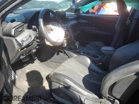 2021 Hyundai Veloster z VIN KMHT36AH0MU009139, wystawiony jako Copart lot #50110694 z przebiegiem Nie podano mil oraz Szkoda całkowita • Salvage title. Historia ofert i sprzedaży dostępna na DreamBid. Obrazek 7.